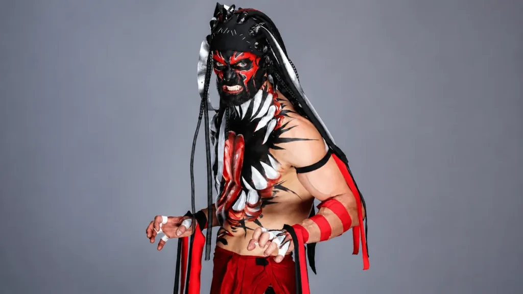Finn Bálor as The Demon during his WWE return with iconic black, red, and white body paint at WrestleMania 42