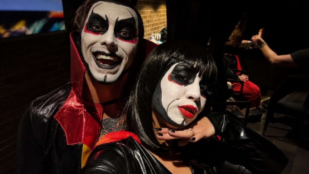 Danhausen posing with his wife Lou Lou la Duchesse de Rière in backstage Halloween-style makeup during a selfie.