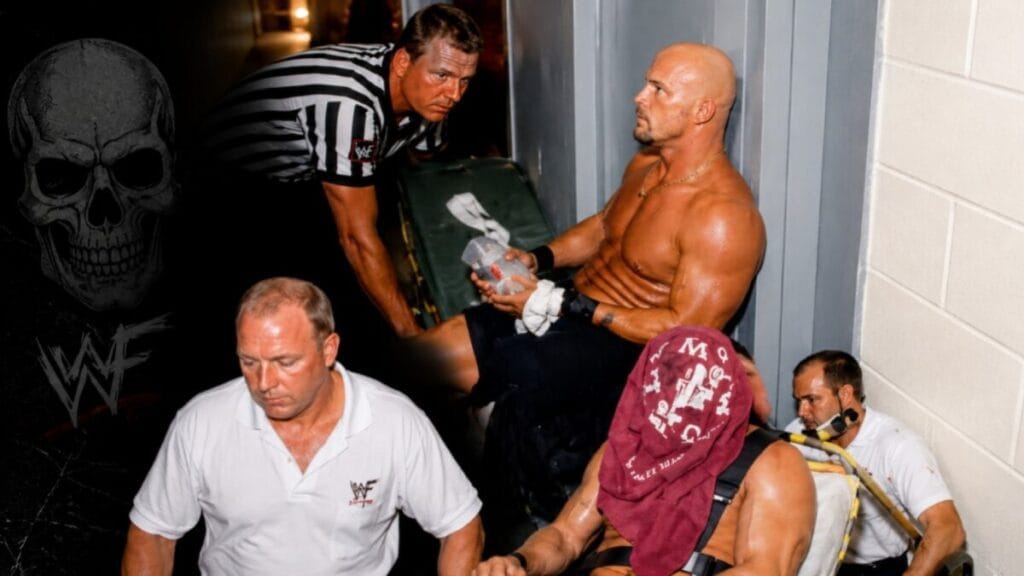 Stone Cold Steve Austin receives backstage medical treatment after a devastating neck injury that permanently impacted his WWE career.