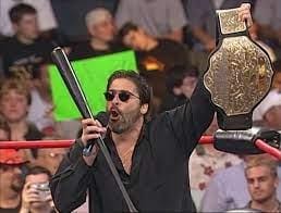 vince rusoo hold wcw championship in his hands
