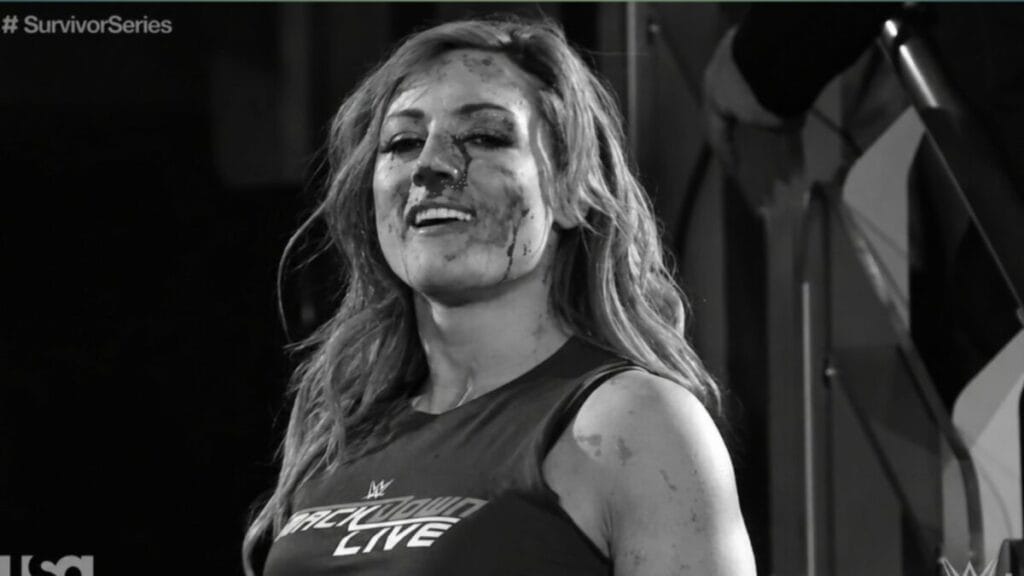 **Image Name (SEO Friendly):**
`becky-lynch-broken-nose-black-and-white-survivor-series.webp`**Image Alt Text:**
`Black and white image of Becky Lynch with a broken nose and blood on her face during WWE Survivor Series 2018.`
