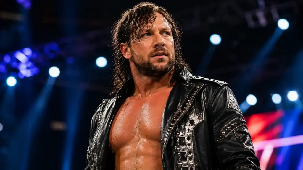 Kenny Omega in the AEW ring during a dramatic arena entrance