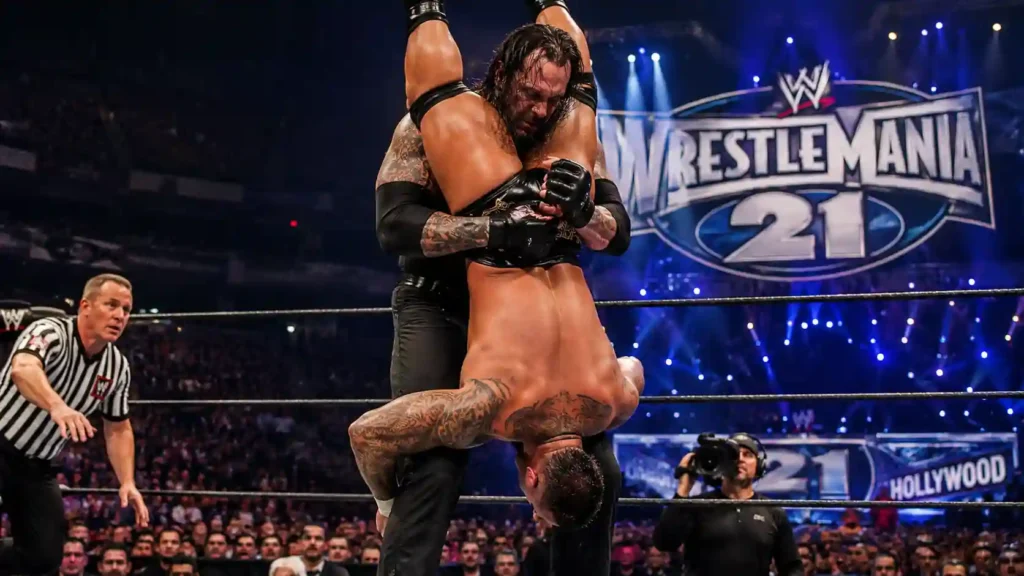 The Undertaker delivers a Tombstone Piledriver to Randy Orton at WrestleMania 21