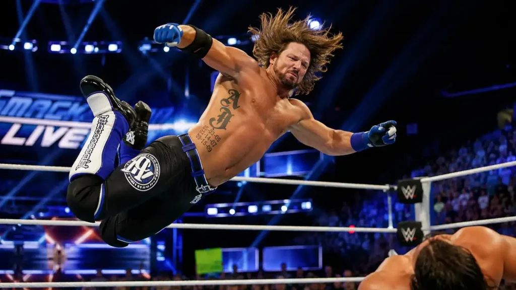 AJ Styles performing a high-flying move in the wrestling ring